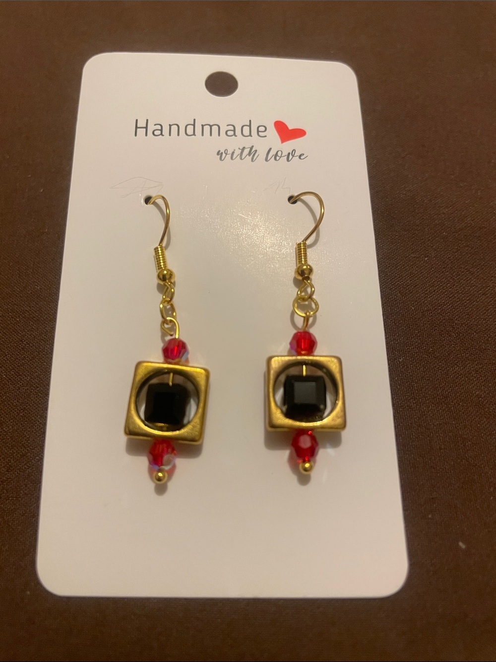H11 - 2/$7 -Handmade Gold Plated Drop Earrings with Black Center and Red Beads